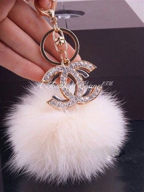 pink chanel keychain|Chanel fluffy keychain.